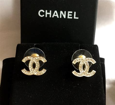 chanel white gold cc logo earrings|genuine chanel earrings.